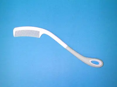 PETTINE CURVO CON MANICO LUNGO PETTINE CURVO CON MANICO LUNGO